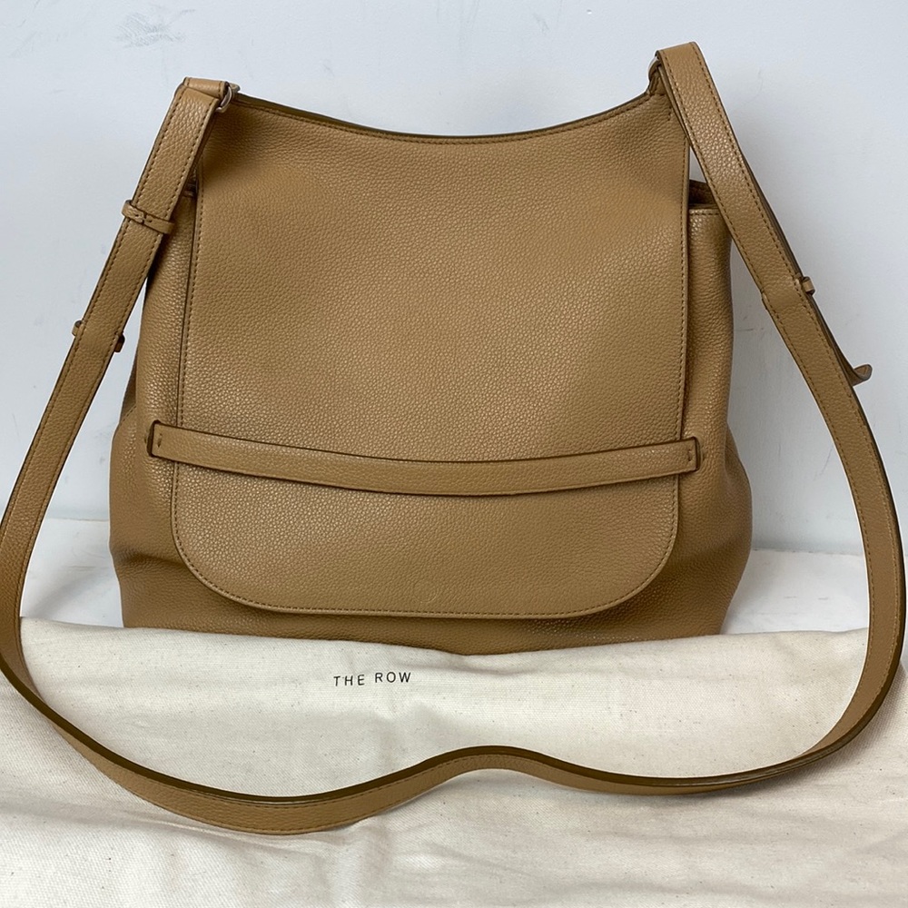 The Row pebbled sand color sideby bag